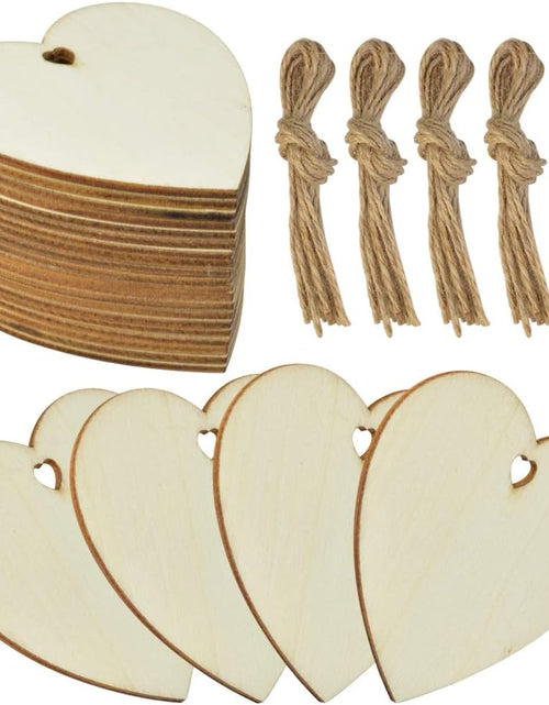 Load image into Gallery viewer, 50 Pieces 3&quot; Natural Heart Wood Slices, DIY Wooden Ornaments Unfinished Predrilled Wooden Heart Embellishments with Natural Twine
