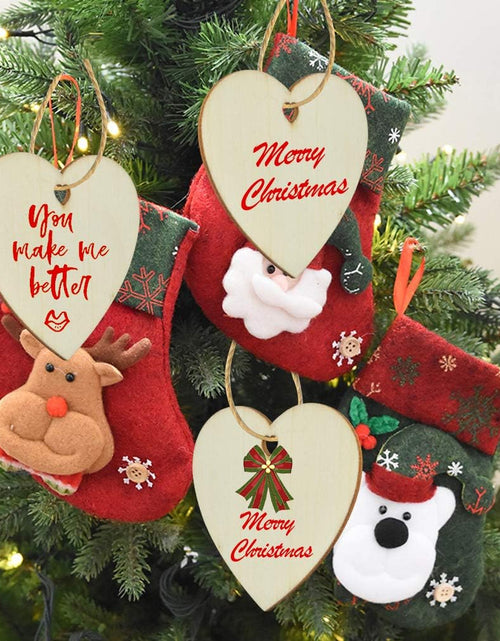 Load image into Gallery viewer, 50 Pieces 3&quot; Natural Heart Wood Slices, DIY Wooden Ornaments Unfinished Predrilled Wooden Heart Embellishments with Natural Twine
