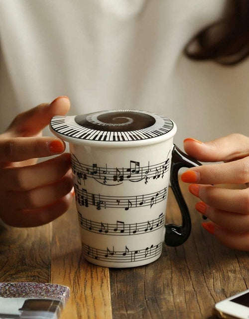Load image into Gallery viewer, Creative Ceramic Musician Coffee Mug Tea Cup with Lid Staves
